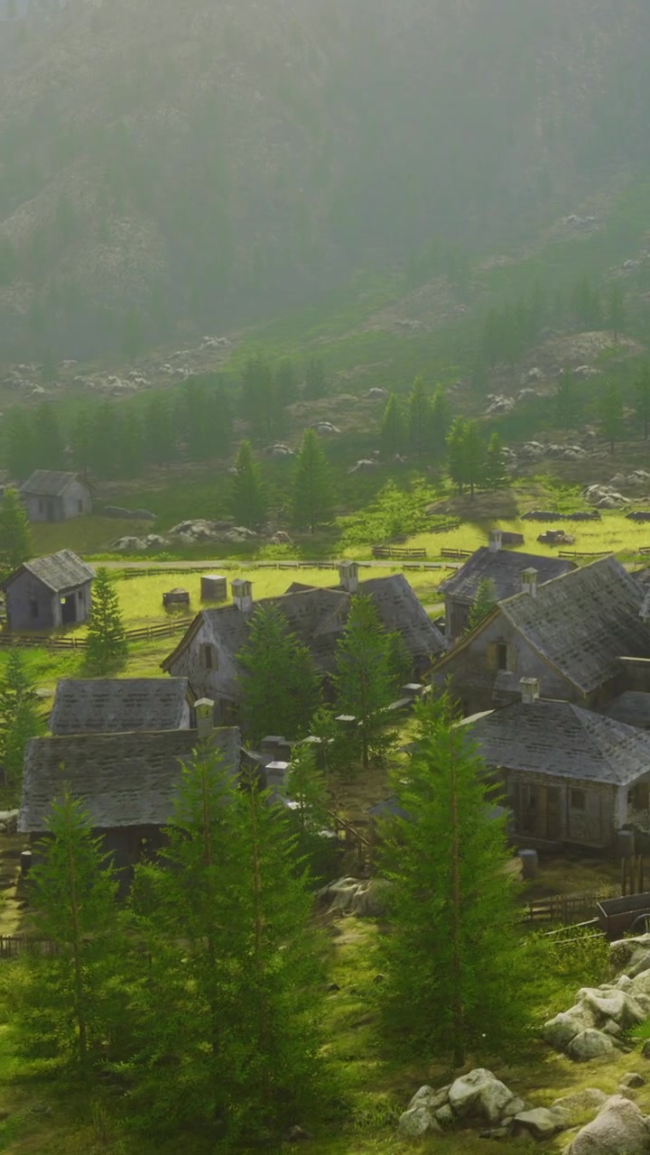 Old village in a green valley surrounded by trees and mountains on sunny day