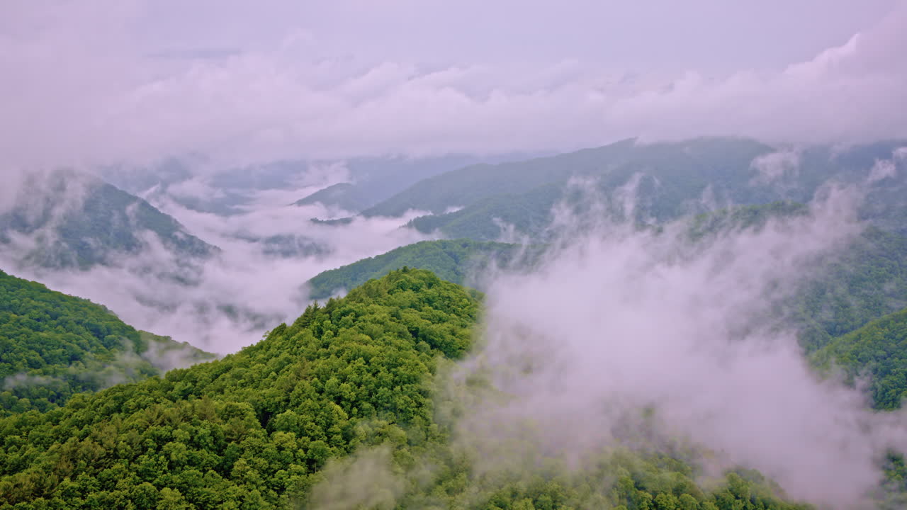 Drone captures the morning fog melting into the Smoky horizon