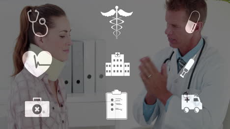 animation of digital icons over caucasian male doctor with patient in hospital