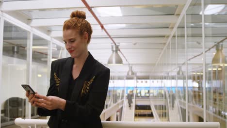 businesswoman using mobile phone in office 4k