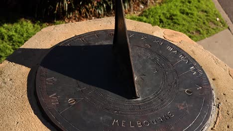 sundial casting shadow in melbourne park