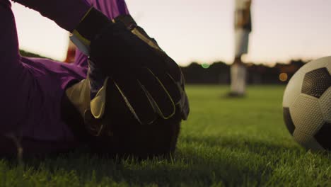 video of mad african american football player siting on field