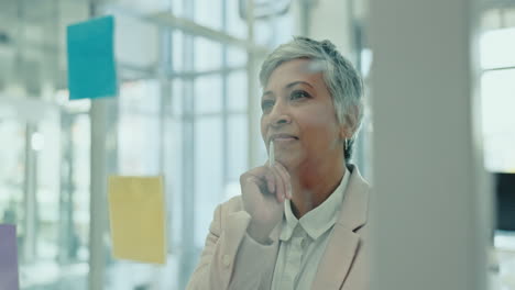 thinking, glass wall and mature business woman