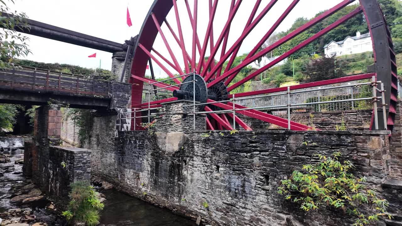 Snaefell Wheel, also known as Lady Evelyn, standing by the Laxey river in the Isle of Man