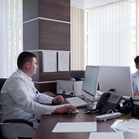 doctor using computer at desk