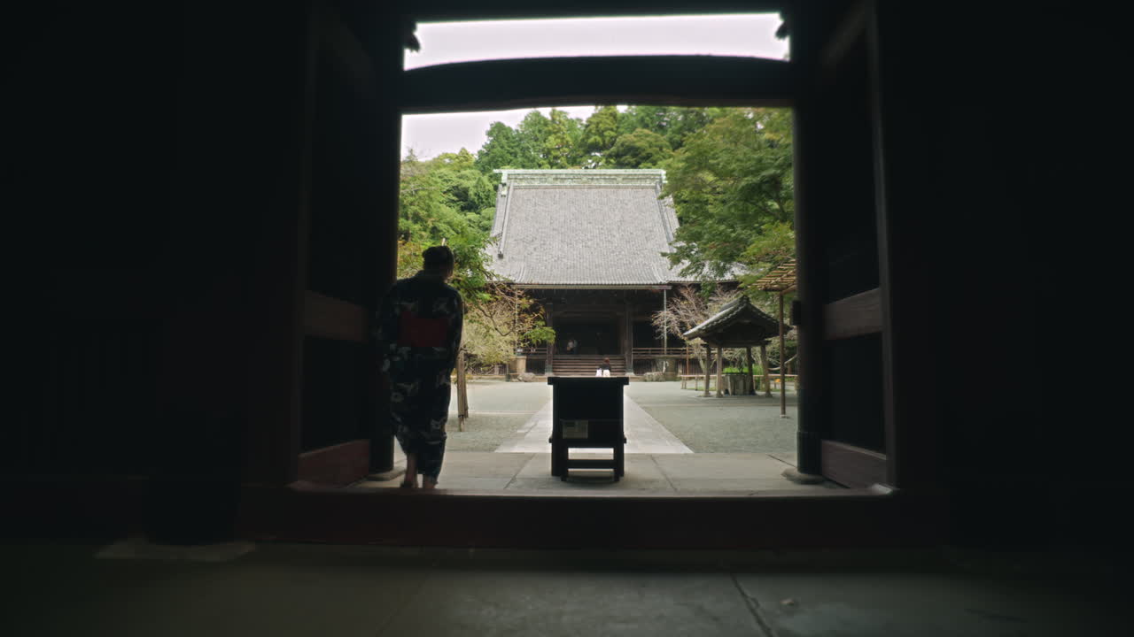Woman in Kimono at a Japanese Temple