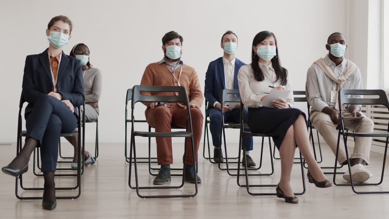 Business People Wearing Masks on Conference