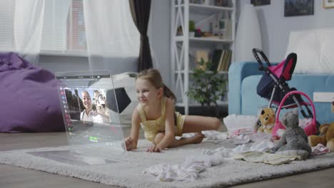 child having a video call in a playroom