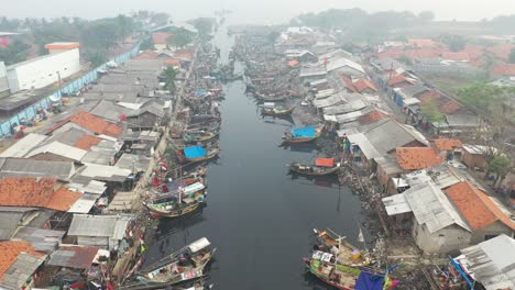 fishing village aerial view with pollution