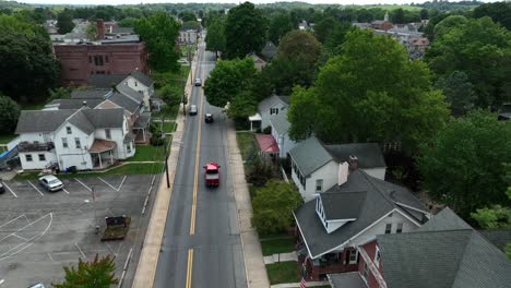 Tracking-shot-of-trucks-driving-through-American-city