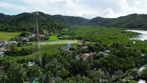 rural town surrounded by green lush nature in baras, catanduanes island, philippines