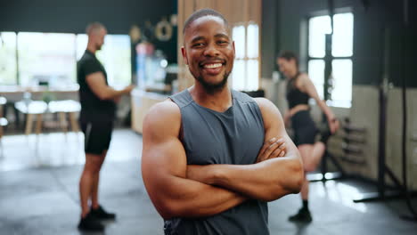 man smiling in gym with others