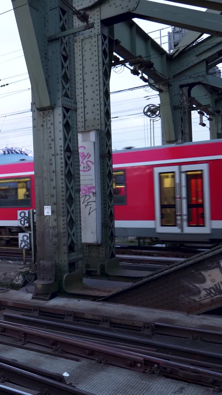 Red Train on Elevated Tracks