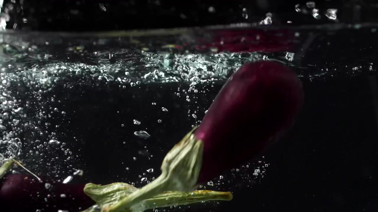 eggplant falling into the water and crosing the shoot