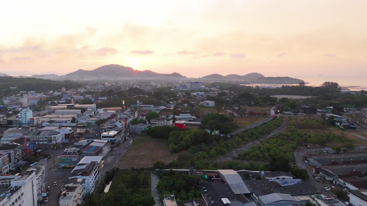 Cinematic drone footage of the vibrant streets and historic buildings of Phuket, Thailand