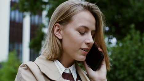 woman on phone call in urban setting