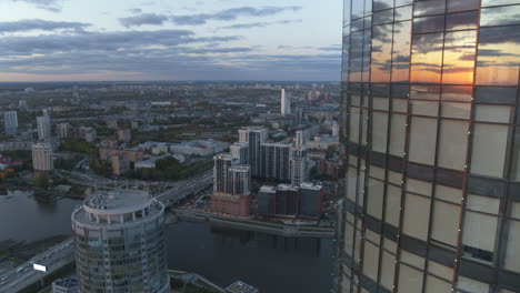 sunset over a modern city skyline