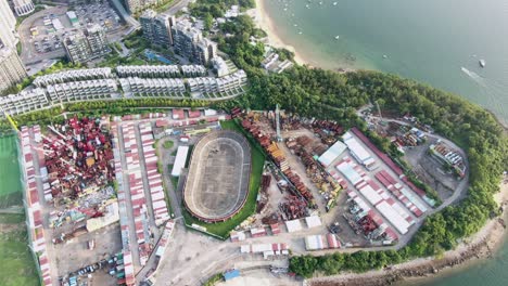 Aerial-view-of-Hong-Kong-Wu-Kai-Sha-area-with-modern-residential-building-complex-and-open-bay