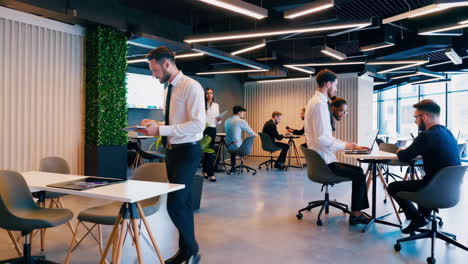 professionals working in a modern, open-plan office