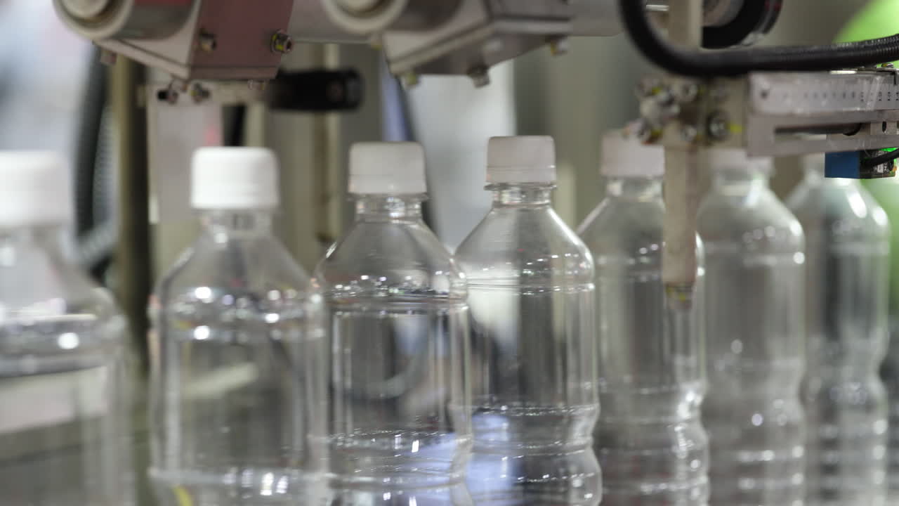 Automated Water Bottle Filling on a Production Line in a Factory