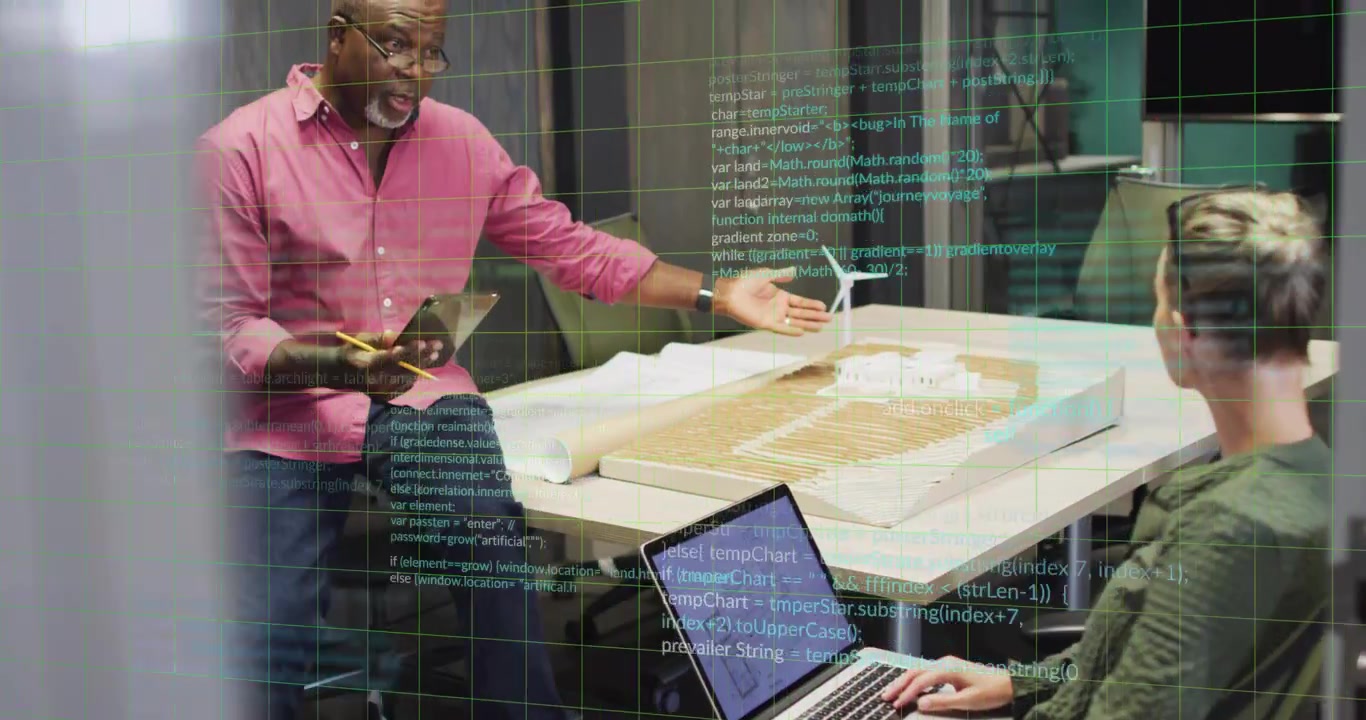 Woman typing laptop, initiating lead standing gesturing toward turbine for design with AR overlay