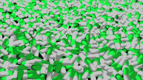 primer plano de un gran número de pastillas verdes y blancas