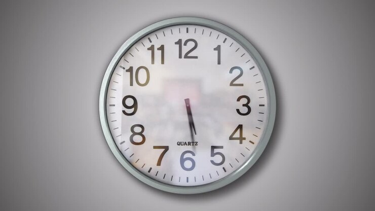 Analogue Wall Clock Timelapse Loop with Gray Background