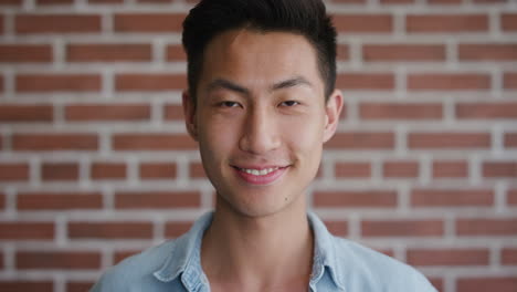 portrait-independent-young-asian-man-student-smiling-enjoying-success-looking-happy-confident-male-slow-motion