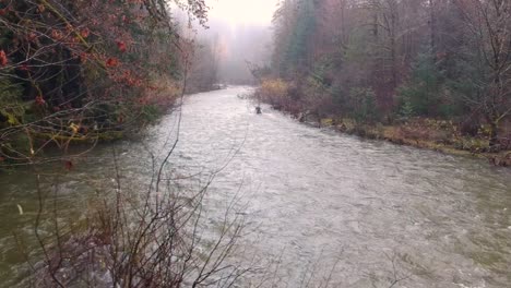 fast moving river in autumn in canada