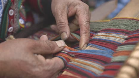 macro of weaving in peruvian village