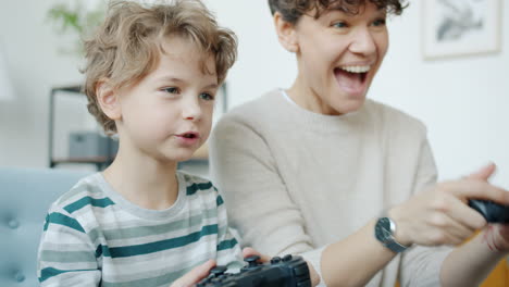 mother and son playing video games