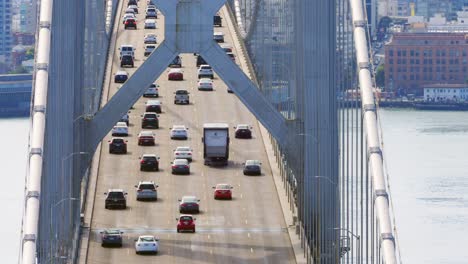 Bay-suspension-Bridge-San-Francisco-sunday-traffic-midday-sunny-february-timelapse-close-up-downtown