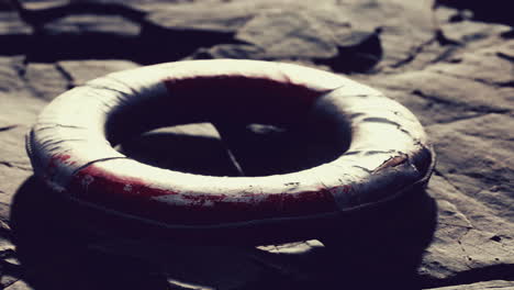 very old abandoned grungy lifebuoy