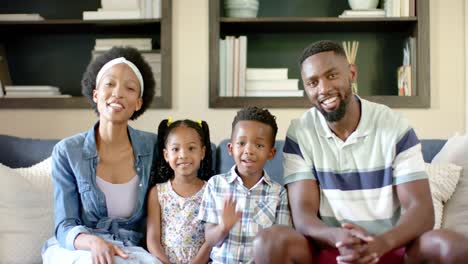 Portrait-of-happy-african-american-family-waving-hands,-in-slow-motion