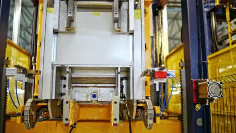 robotic equipment at work. modern factory indoors. upgraded technology inside the plant. close-up industrial process.