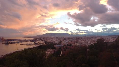 Bright-pink-sunset-over-city-of-Malaga-in-Spain