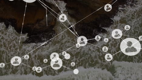 animation of network of connections with icons over sea view