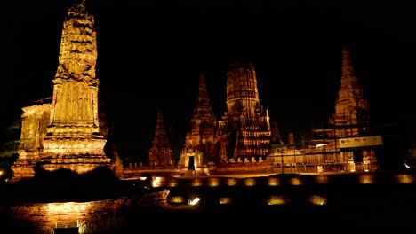 illuminated temple at night in ayutthaya, thailand