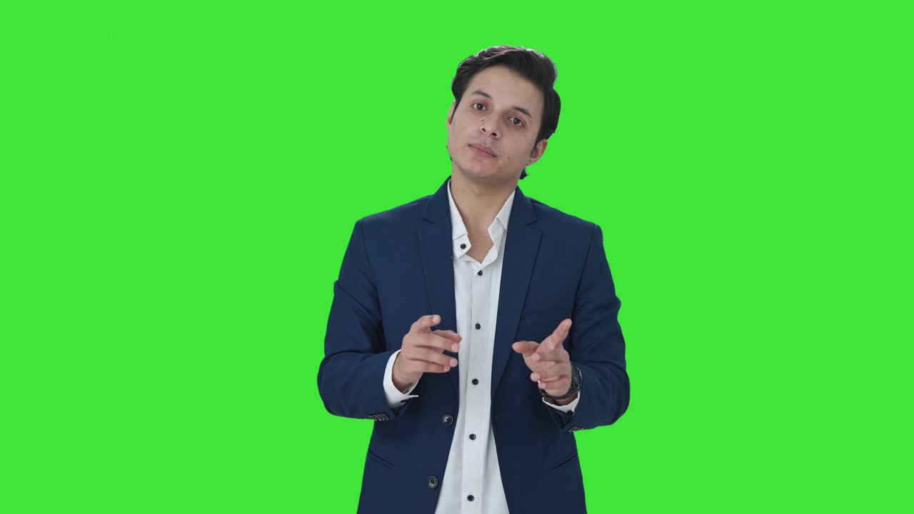 Manager indiano che parla con qualcuno Green screen