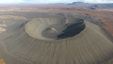 Aerial-drone-shot-of-an-extinct-volcano-with-forest-in-Mongolia-sunny-day