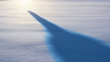 shadow on a snow field