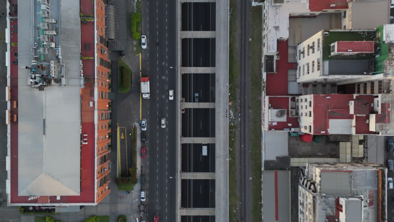 Aerial top view of modern highway in Puerto Madero in neighborhood of historic buildings. Buenos Aires. 4k.