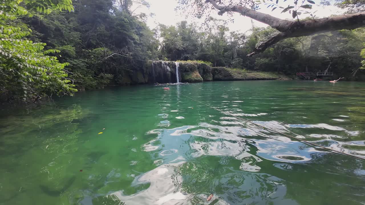 Pan across swimming hole in river at Mimosa Ecotourism Ranch, Brazil