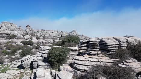 flying with a drone through the natural area of ​​el torcal, a karst area located in antequera in the province of malaga, spain