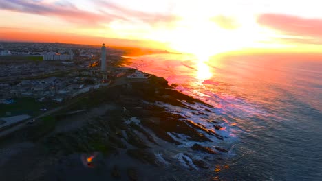 Aerial-View-of-the-Lighthouse-of-Casablanca-Morocco-Colorful-sunset