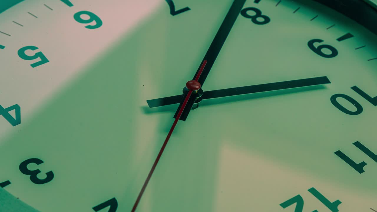 Time lapse on a modern wall clock.  Close up to a wall clock