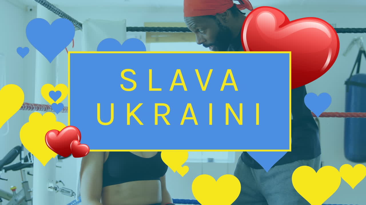 animación de slava ukraini y el corazón flotando sobre el ring de boxeo