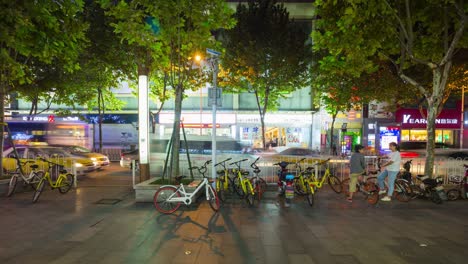 wuhan city night time illuminated traffic street sidewalk panorama 4k time lapse china