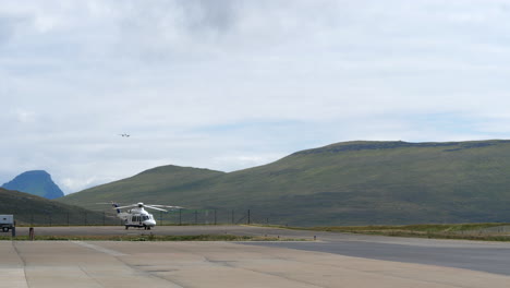 passenger airplane in final approach for vagar airport, faroe islands