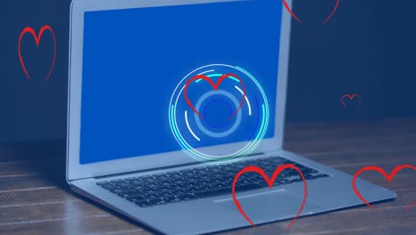 animación de corazones cayendo sobre el portátil con espacio de copia